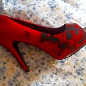 Red hot Iron Fist heels size 10